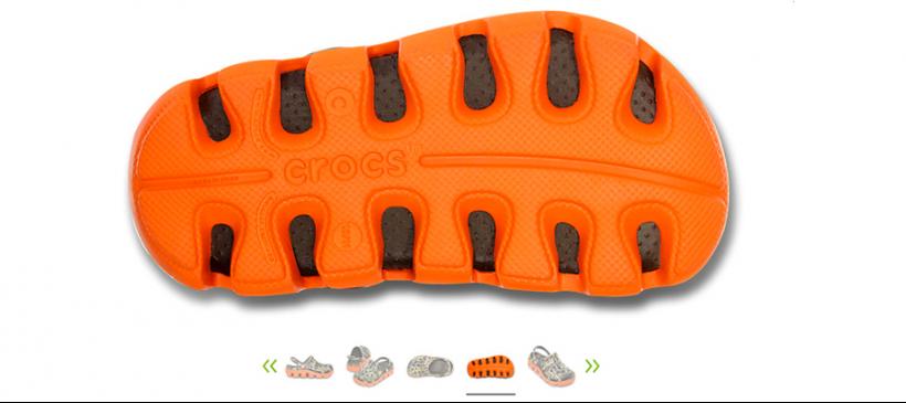 camo crocs with orange sole